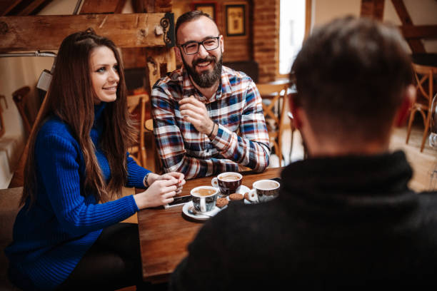 istock Cheerful friends at cafe 1139609173