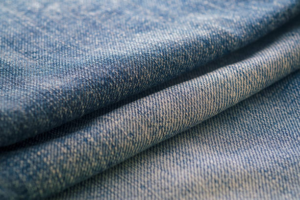 istock Texture of blue jeans textile close up 1139609232