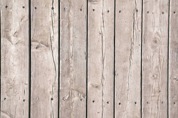 istock Old gray boards nailed. Texture can be used as a background for design and creativity 1139610007