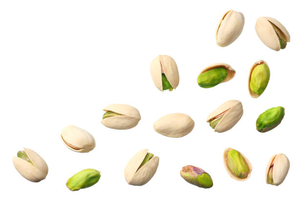 istock pistachio isolated on the white background. top view 1139610096