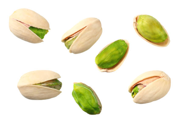 istock pistachio isolated on the white background. top view 1139610097