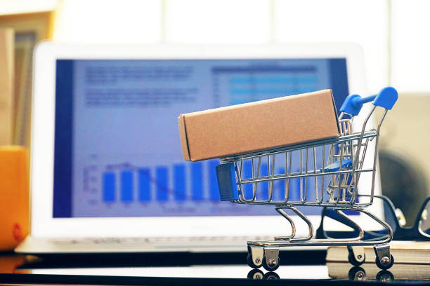 istock Packaging box on shopping cart with background computer screen , onlinne shopping concept. 1139610161