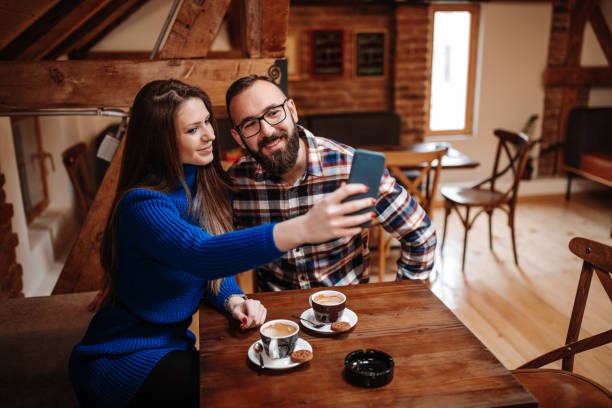 istock Happy couple taking selfie 1139611387