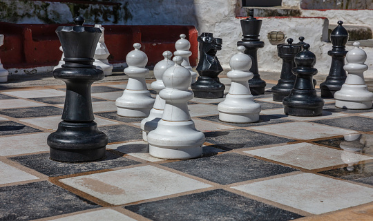 Greece, Kea island. Giant set of chess pieces on Ioulis town street