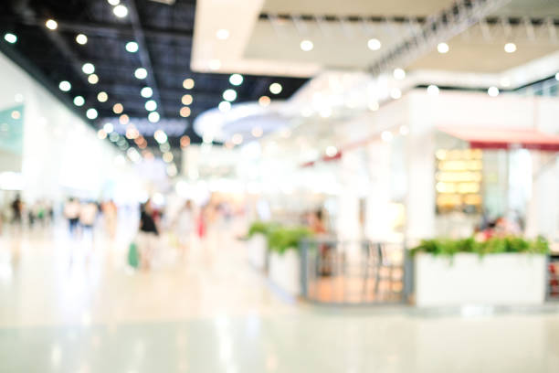 istock Blurred background, Blur store with people and bokeh light, business background 1139614097