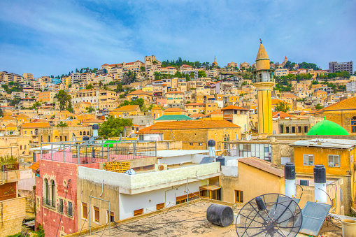 Cityscape of Nazareth with white mosque, Israel
