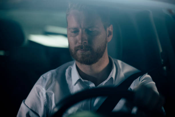 istock Businessman driving car 1139614979
