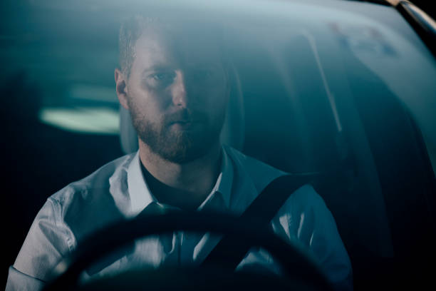 istock Businessman driving car 1139615564