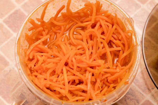 istock Chopped carrots in food plastic container 1139617575