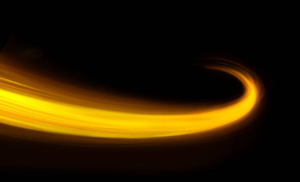 istock Glowing shiny curve light trail lines effect in black background. 1139619909