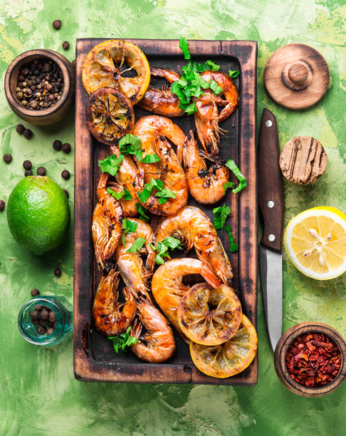 Grilled large prawns Grilled tiger shrimps with spice and lemon.Delicious seafood. black tiger shrimp stock pictures, royalty-free photos & images