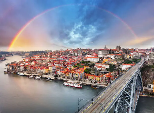 Photo of Rainbow over Porto city skyline, Portugal