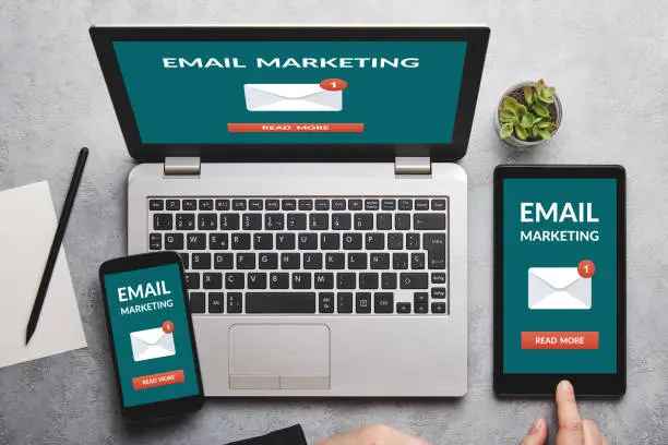 Photo of Email marketing concept on laptop, tablet and smartphone screen