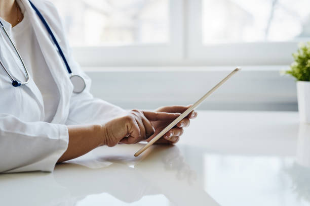 istock Female doctor working on a digital tablet 1139629447