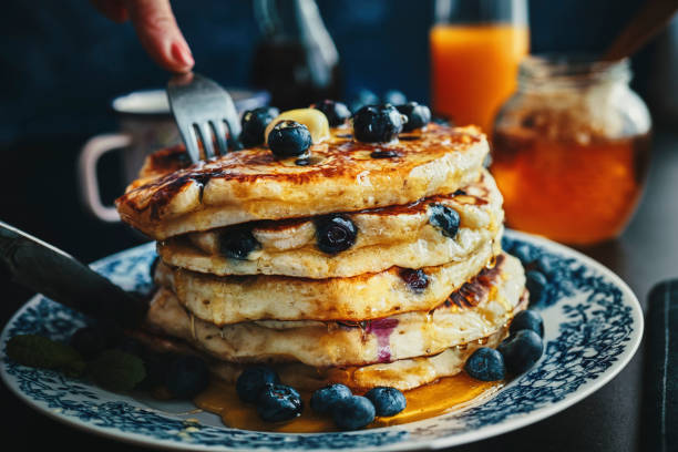istock Pancake Tower with Blueberries and Maple Syrup 1139629619