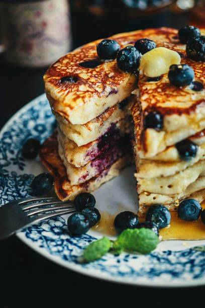 istock Pancake Tower with Blueberries and Maple Syrup 1139629631