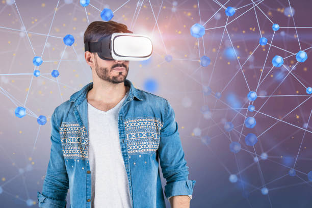 istock Man in jeans shirt in VR glasses network interface 1139630282