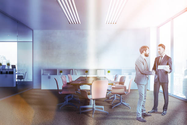 istock People in white meeting room interior 1139630814
