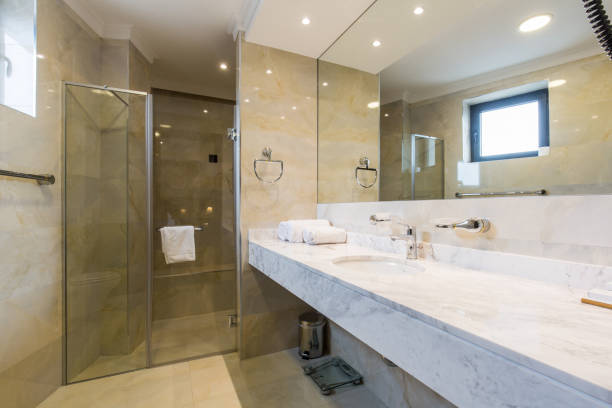 istock Hotel bathroom interior with shower cabin 1139632637