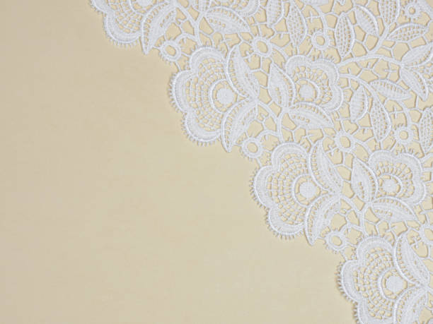 istock White lace on a beige background 1139633492