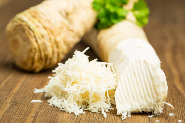 Horseradish on wooden board Food and drink: Horseradish on wooden board austrian culture photos stock pictures, royalty-free photos & images