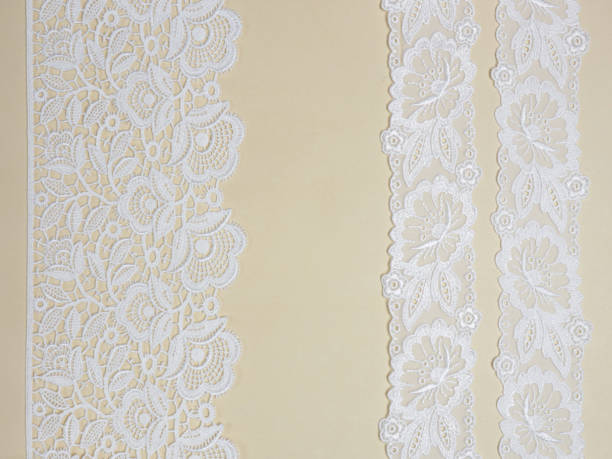 istock White lace on a beige background 1139634977