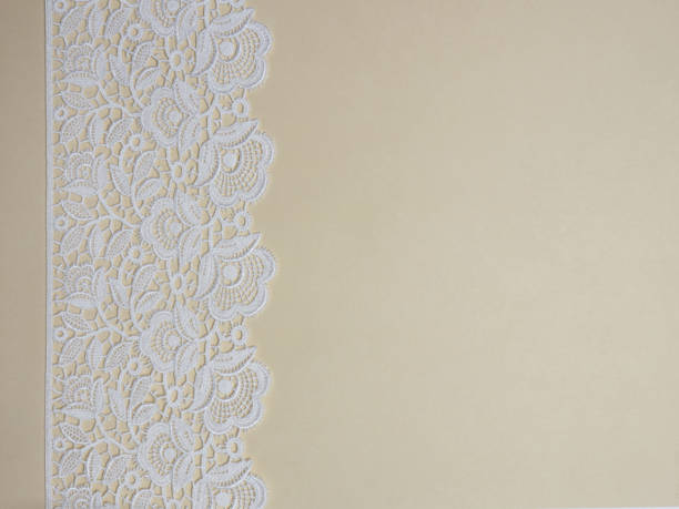 istock White lace on a beige background 1139636222