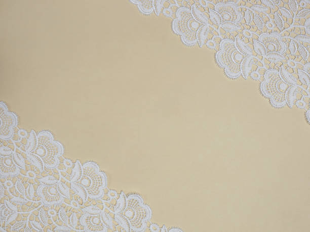 istock White lace on a beige background 1139636939