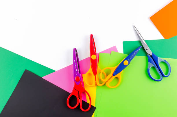istock Colorful paper with scissors for children on a white 1139638210