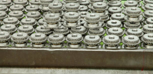 istock New steel gears, factory interior 1139642497