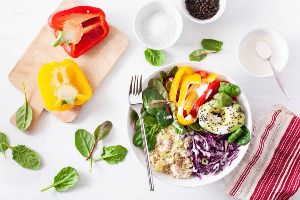 istock veggie couscous lunch bowl with avocado, bell peppers, spinach and red cabbage 1139642623