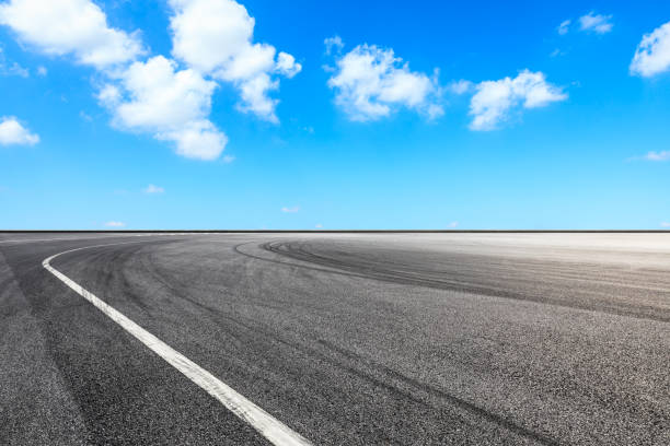 istock Asphalt race track ground and beautiful sky clouds scene 1139647310
