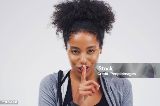 Shhhh Dont Tell Them Yet Stock Photo - Download Image Now - Women, African-American Ethnicity, One Woman Only