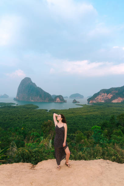 istock Woman  looking at Phang Nga bay 1139649243
