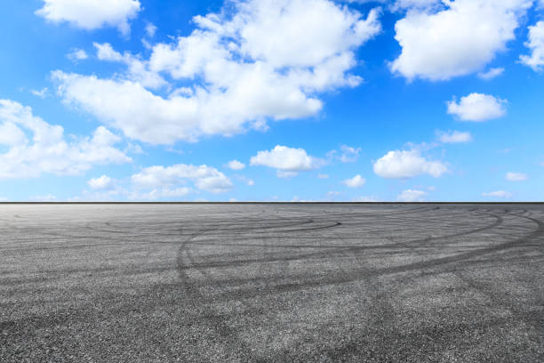 istock Asphalt race track ground and beautiful sky clouds scene 1139652706