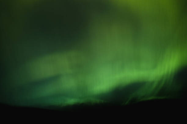 istock blur abstract green defocused lens flare glow 1139657058