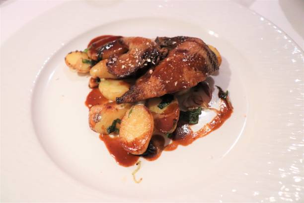 istock ROTI PIGEON WITH BAKED POTATO 1139661521