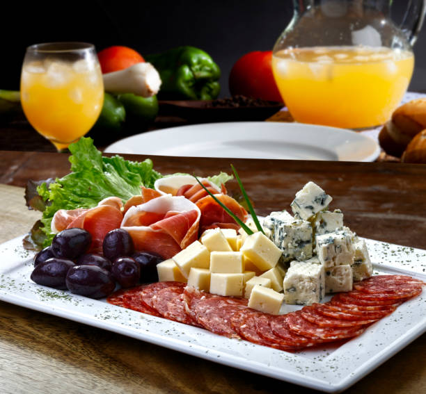 Salad of cold cuts, cheeses, salami, olive