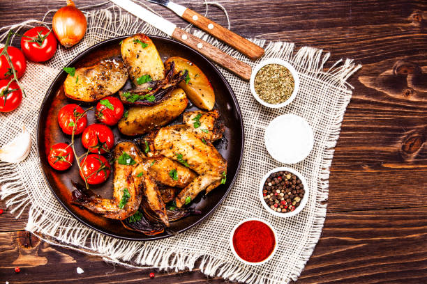 Serving chicken potato tomato casserole dish in oven at mugla turkey