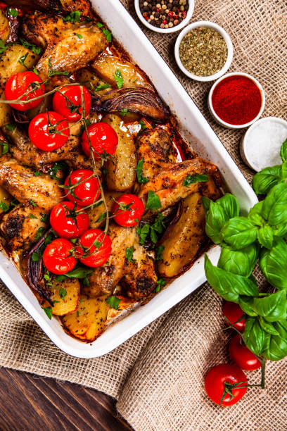 istock Chicken wings and vegetables 1139665174