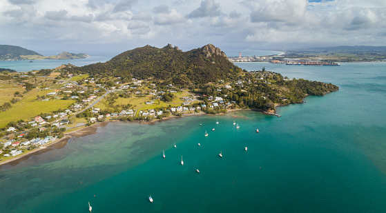 Panoramic view of Whangarei Heads with houses on the side.