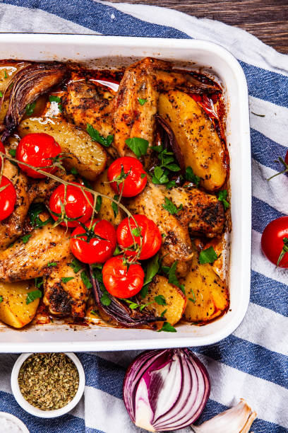 istock Chicken wings and vegetables 1139666212