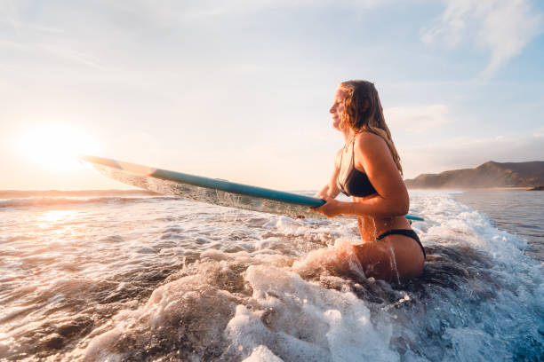 istock Surfer girl waiting for a big wave. 1139666786