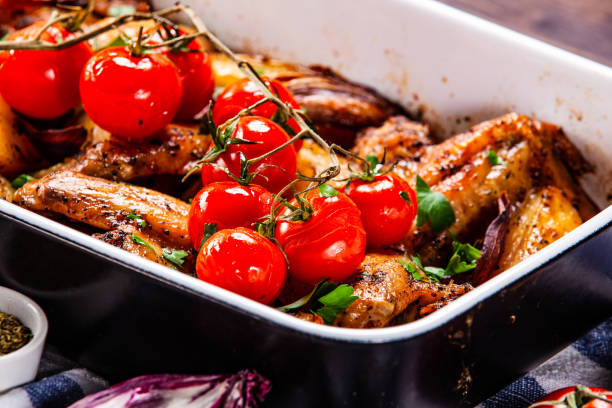 istock Chicken wings and vegetables 1139666981