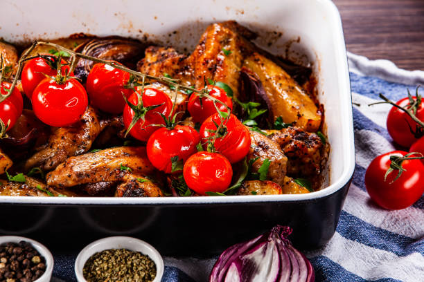 istock Chicken wings and vegetables 1139667107