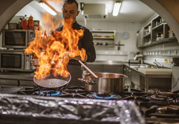 istock Chef flambing food 1139667304