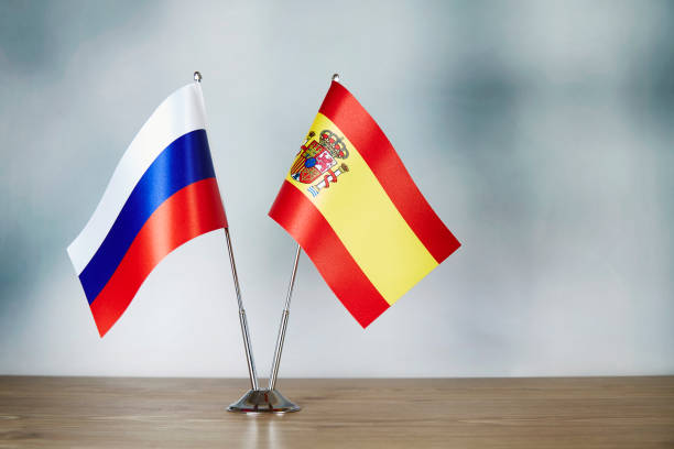 istock Russian and Spanish flag standing on the table 1139668970