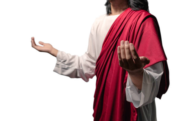 istock Jesus christ raised hands with open palms and praying to god 1139670664