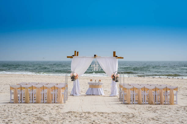 A simple beach wedding arch in Gulf Shores, Alabama stock photo