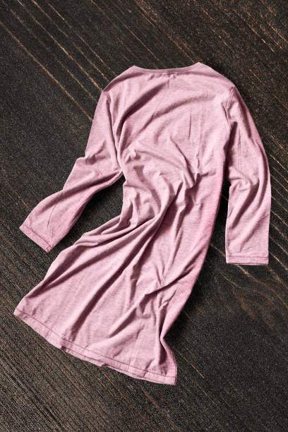 istock Dress on wooden background 1139672211